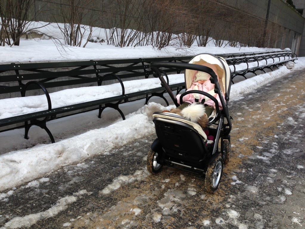 Child in double stroller