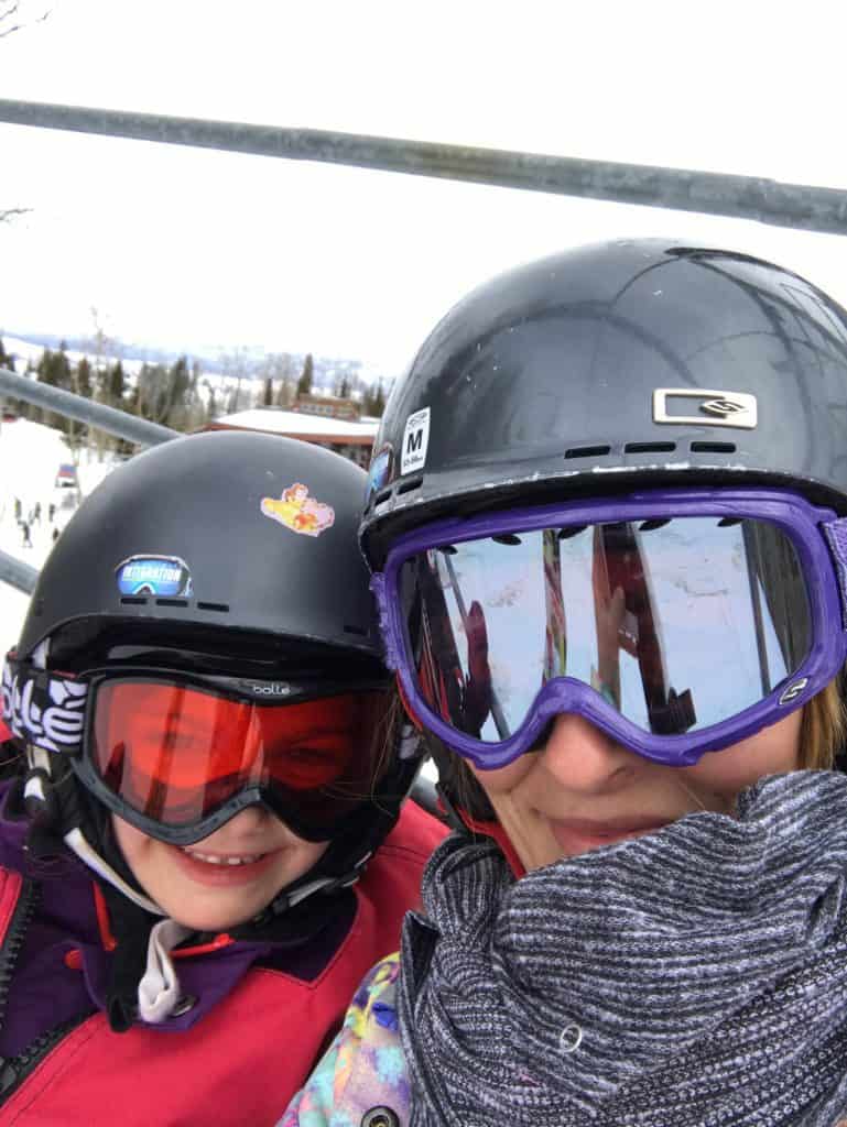 Mom and child skiing in Utah