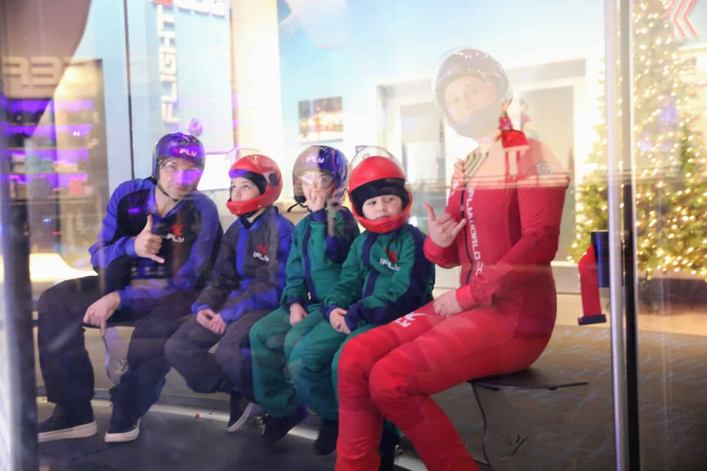 Family and instructor waiting to indoor skydive in NYC