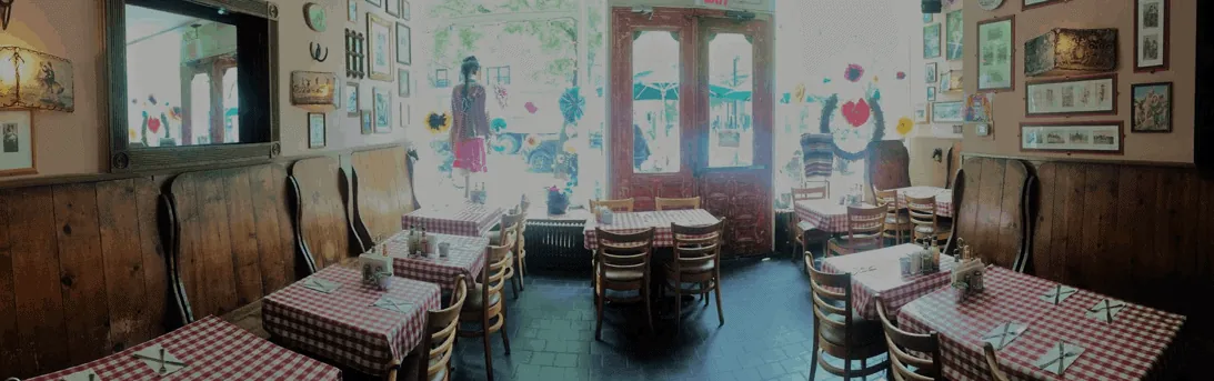 NYC West Village Cowgirl restaurant with other style interior and expansive windows