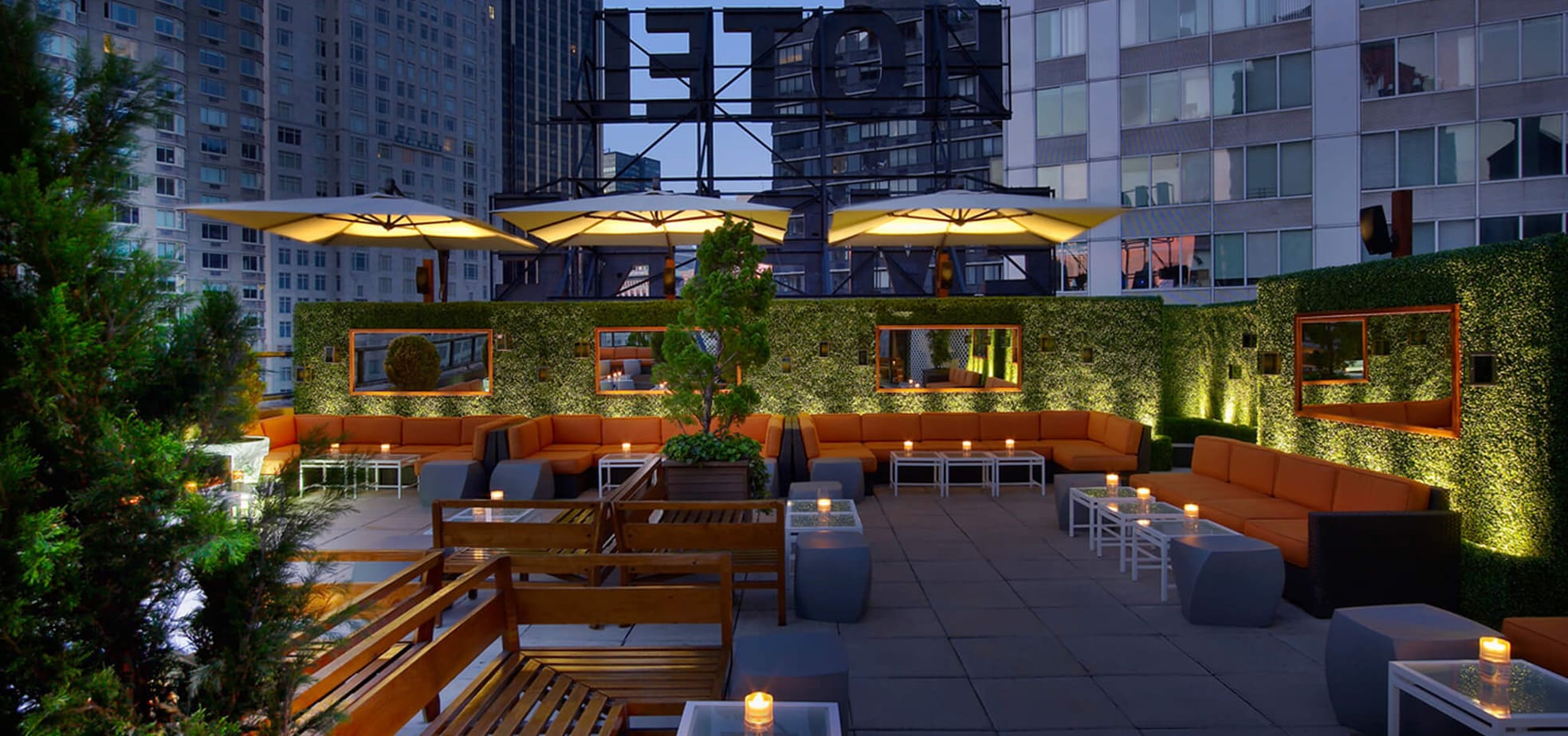 The Empire Rooftop in New York City at night with romantic lighting