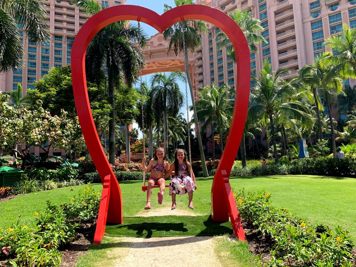 Girls on the heart swing at The Atlantis in the Bahamas