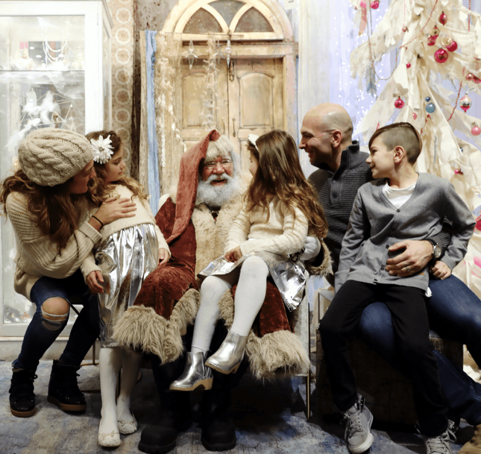 Family visits Santa during Thanksgiving weekend In NYC