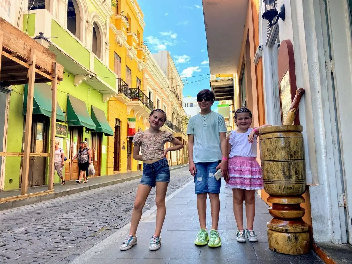 Kids strolling in the colorful streets of San Juan