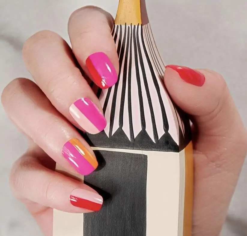 Pink and orange stripes nail design