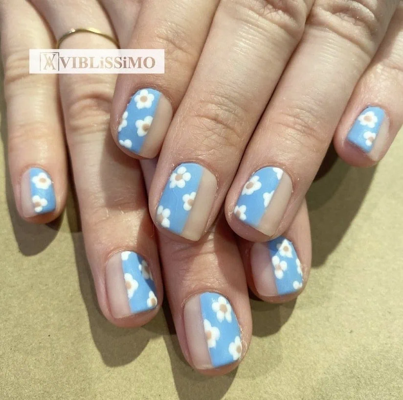 Blue and white floral nail design