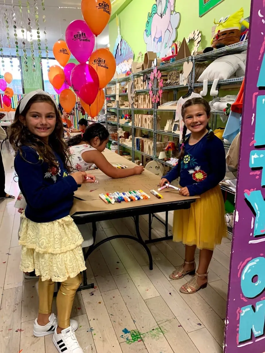 Daughters making crafts for a birthday party at the Craft Studio in NYC