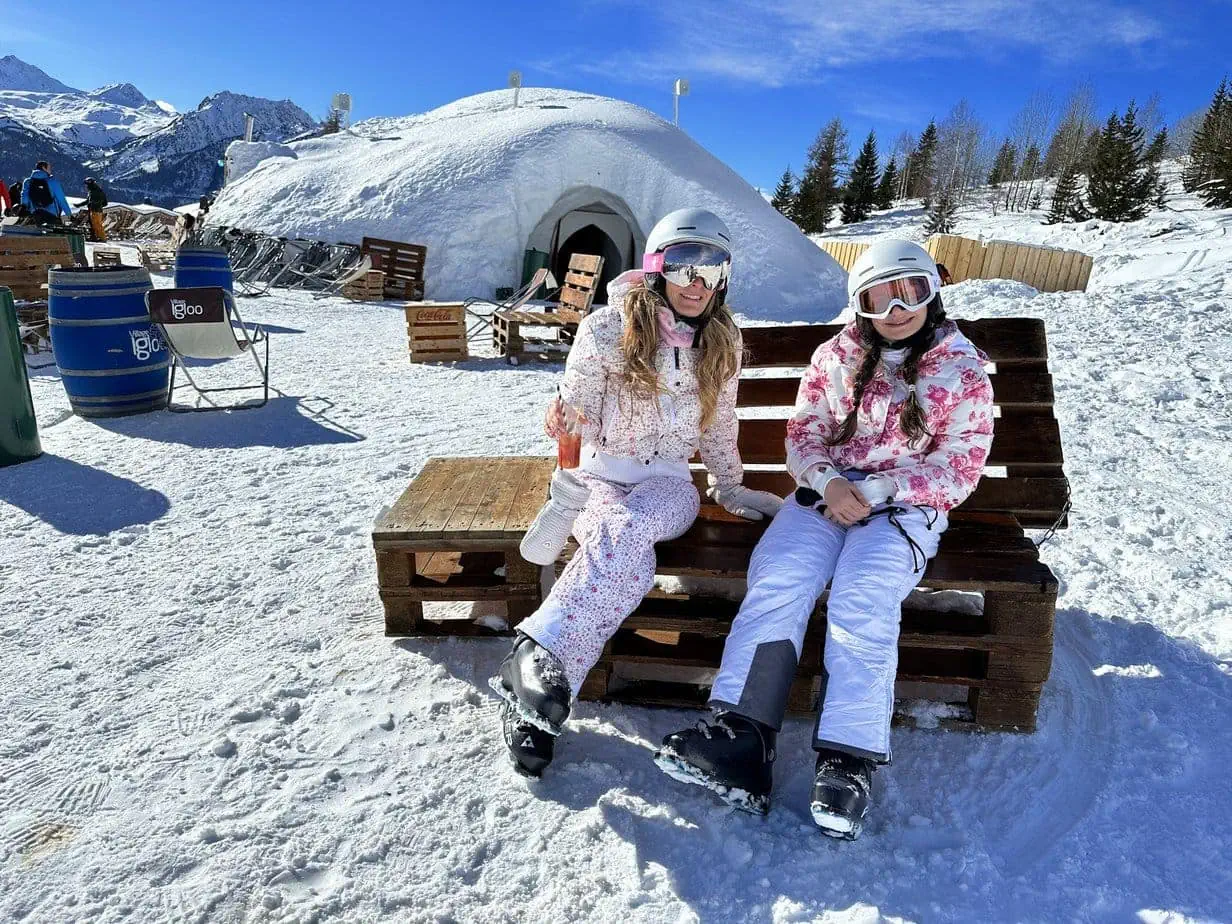 Mother daughter ski trip in matching floral gear