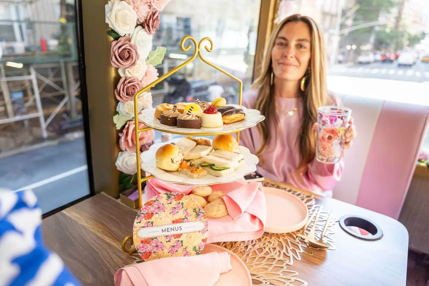 Best high tea spread in NYC with chocolate mini desserts, cucumber finger sandwiches, and scones 