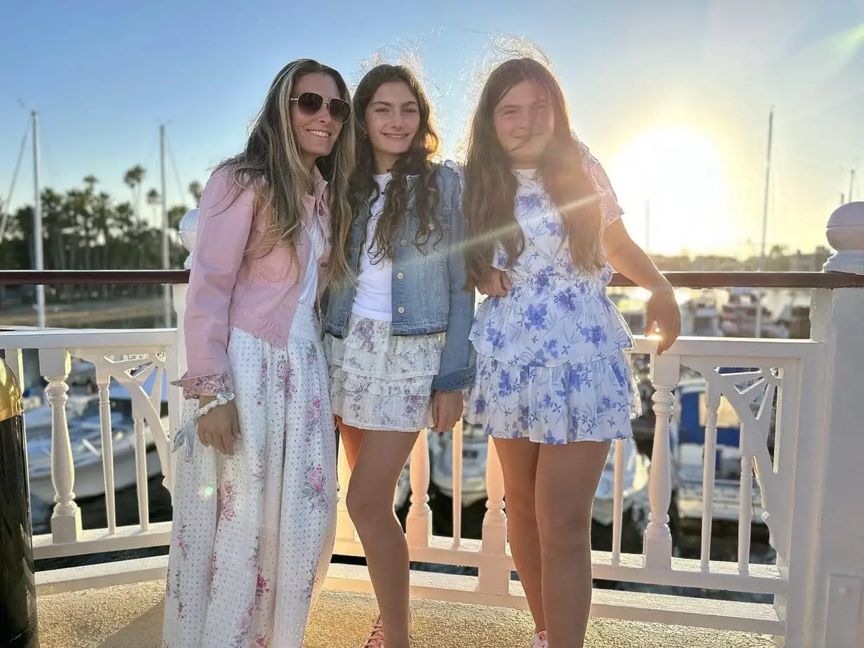 Mother and daughters enjoying sunset in San Diego 