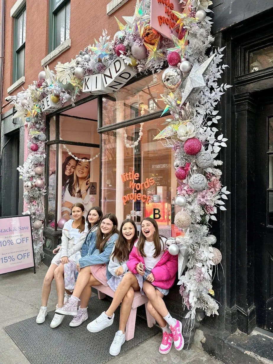 Girls outside the NYC Little Words Project storefront in SoHo